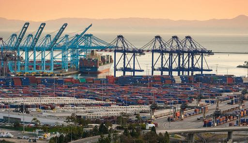 Container port cranes at dusk